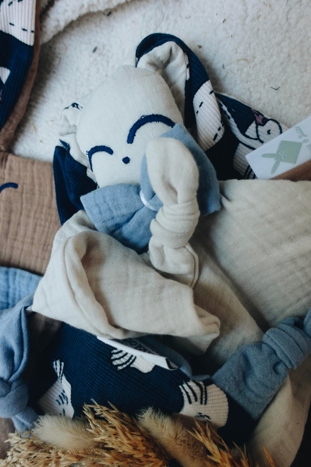 Doudou Lange Câlin Noeuds - Blue Swan